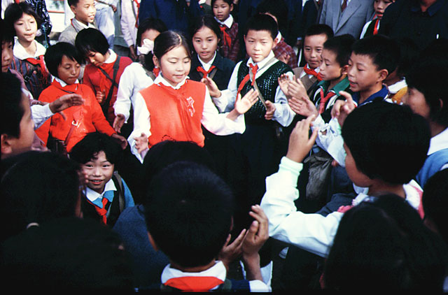 School children singing in a park in Hangchou