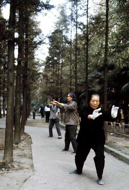 taichi woman in white gloves china shanghai