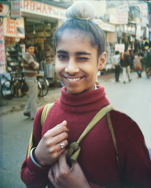 sikh boy blinks with one eye New Delhi India
