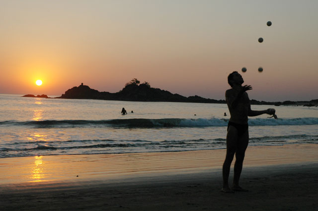 A traveller joggling at sunset on Ohm beach