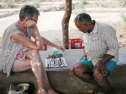 Playing chess in Halfmoon beach, Gokarna, India