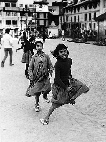 Girls playing on street in Kathmandu Nepal