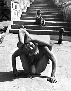 Sadhu, holy man doing yoga