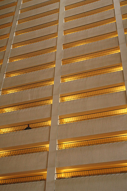 balconies inside a hotel near times square yellow gold one man visible