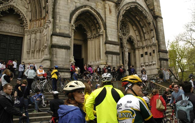 Bicycles and bike riders waiting to enter the cathedral. Blessing of the Bikes at The Cathedral Church of St. John the Divine