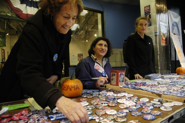 Three Park Democrats at Broadway store selling Obama buttons. Pumpkin with Obama text