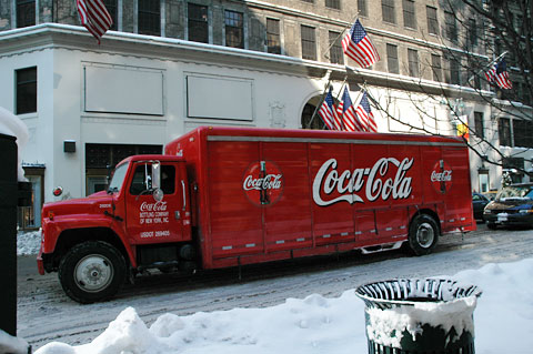 USA flag snow in New York Manhattan Coca Cola