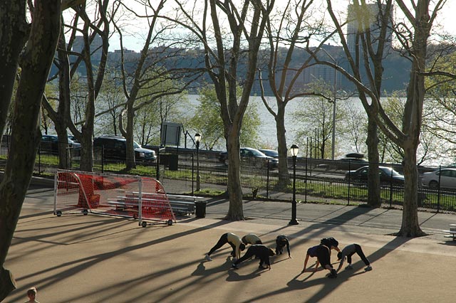 Hudson river, Riverside park, gymnastics with long shadows, west side highway